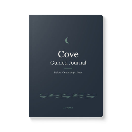 Cove Guided Journal, navy softcover with a sage moon, cream title and the line "Before. One prompt. After."