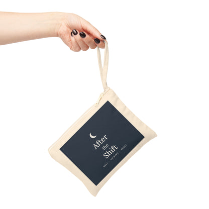 The zipper pouch carried by its wrist strap