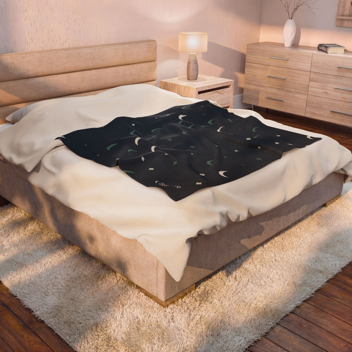 The throw on a bed in a softly lit bedroom