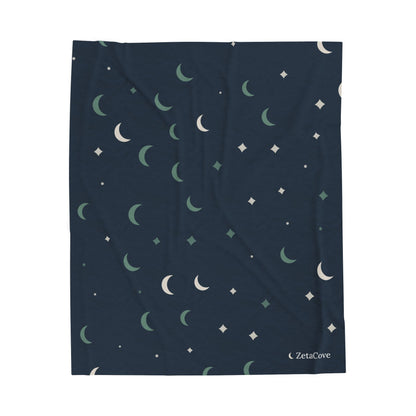 Cove Day-Sleep Throw laid flat: navy with sage and cream moons and stars