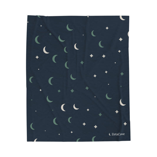 Cove Day-Sleep Throw laid flat: navy with sage and cream moons and stars